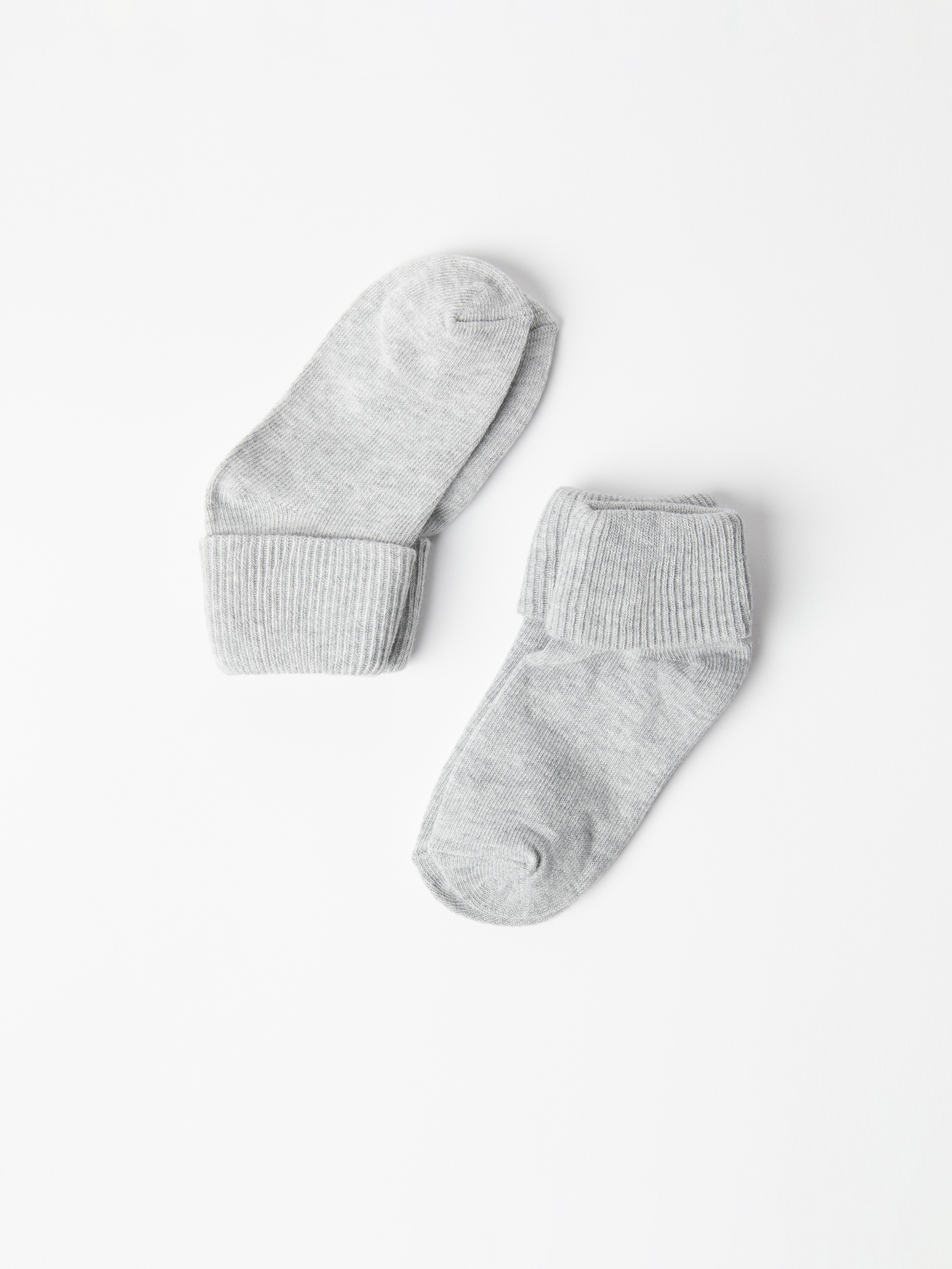 Läs mer om 2-pack baby strumpor enfärgade