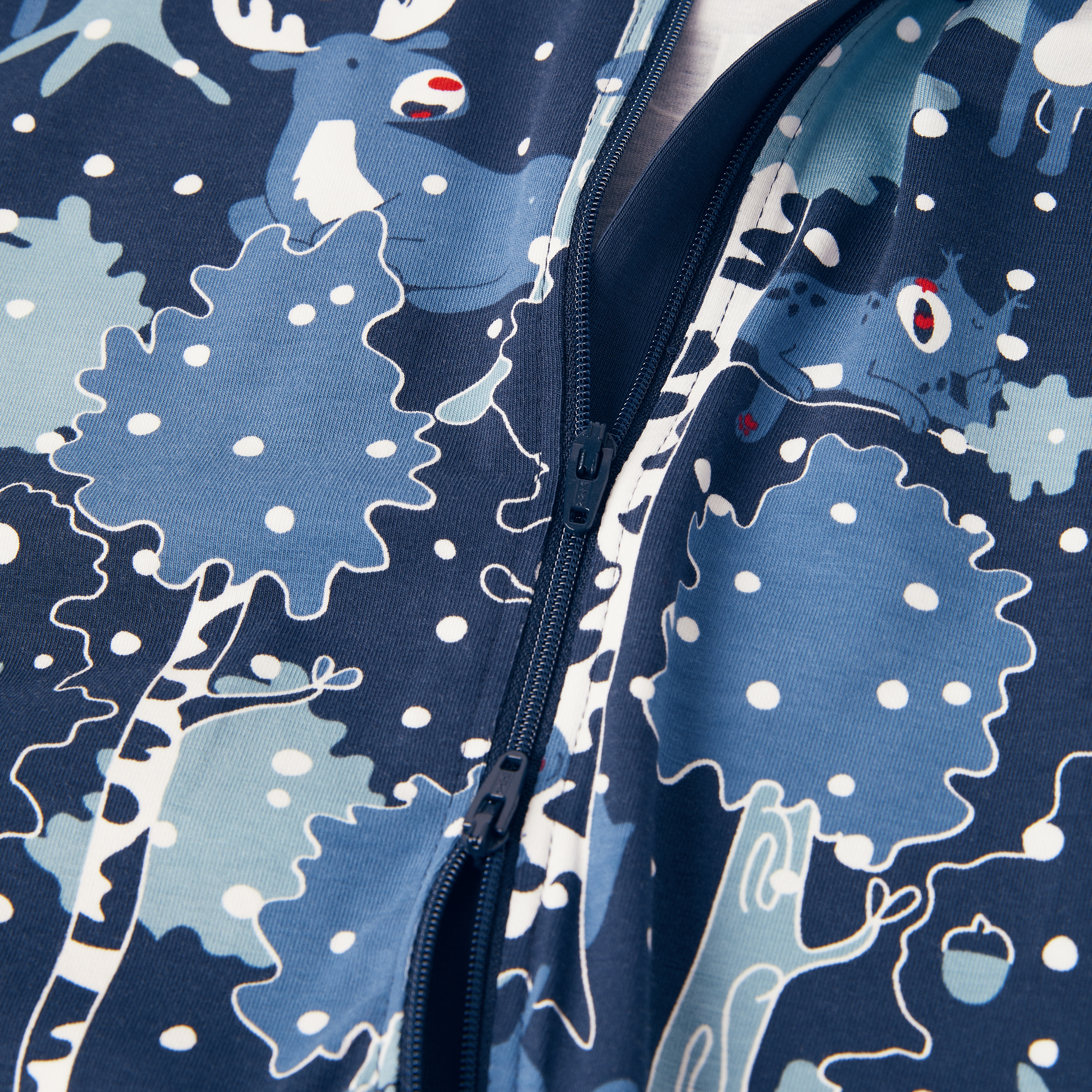 Pyjamasoverall med nordiskt vintertryck baby mörk marinblå