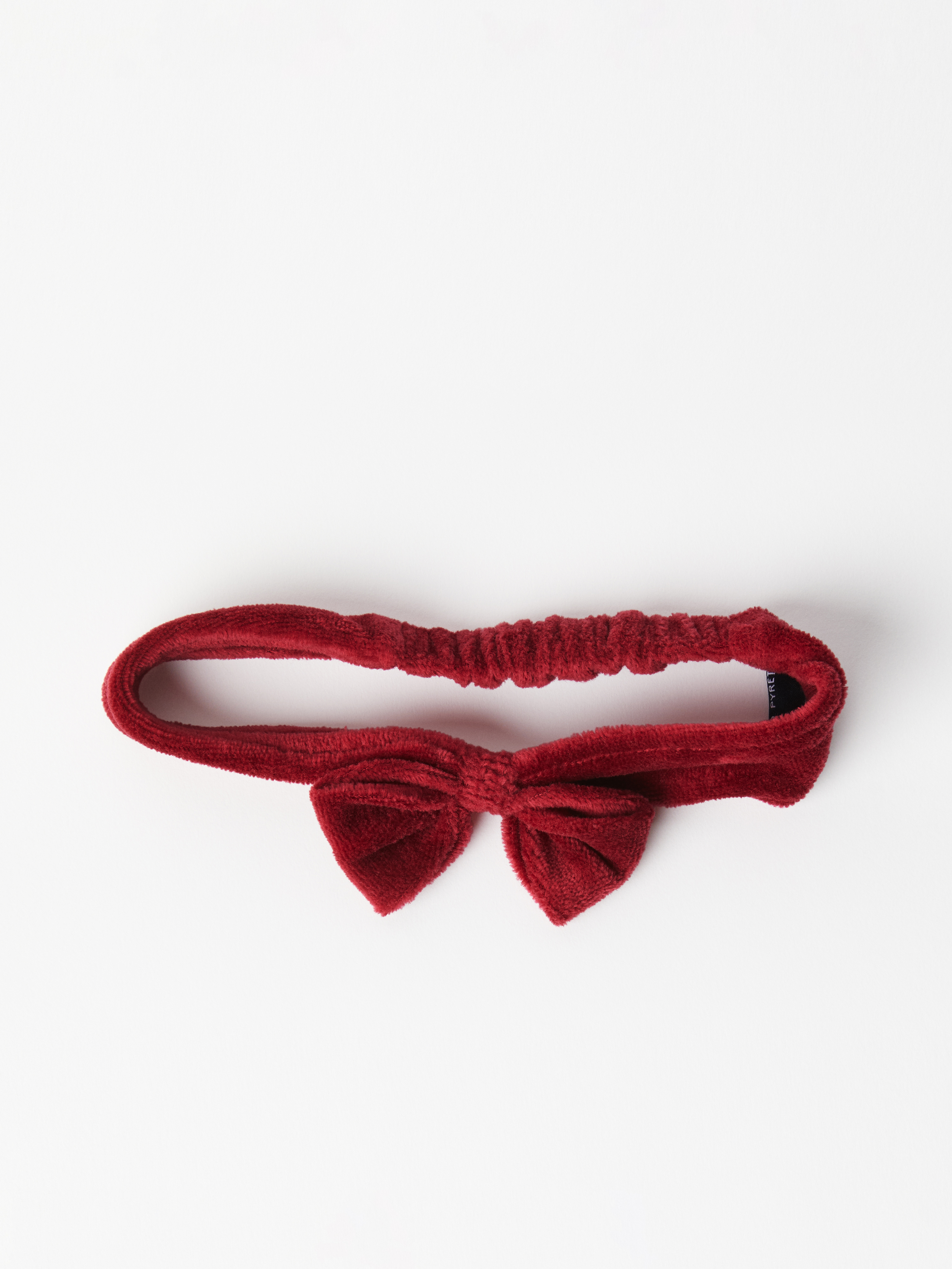 Polarn O. Pyret Elastiskt hårband med rosett röd