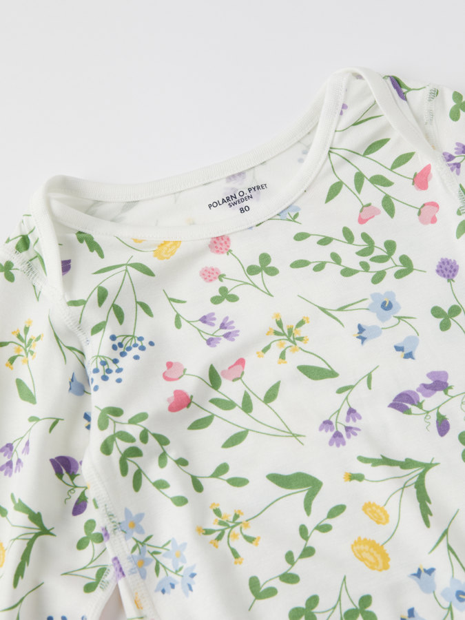 Body omlottlagda axlar blomster