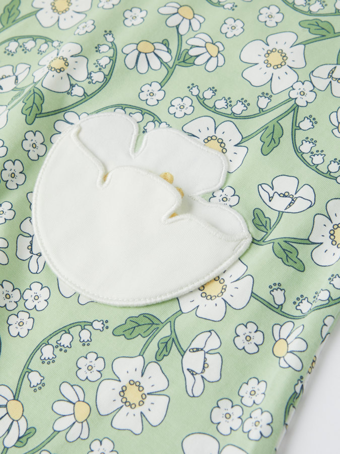 Topp med blomfickor Topp med blomfickor