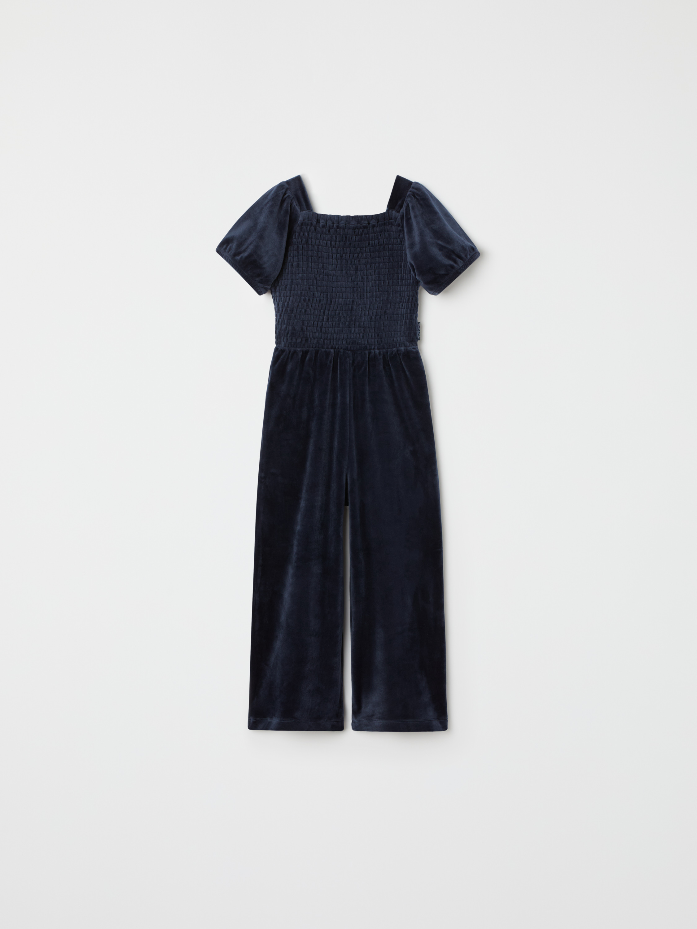 Läs mer om Jumpsuit med puffärmar
