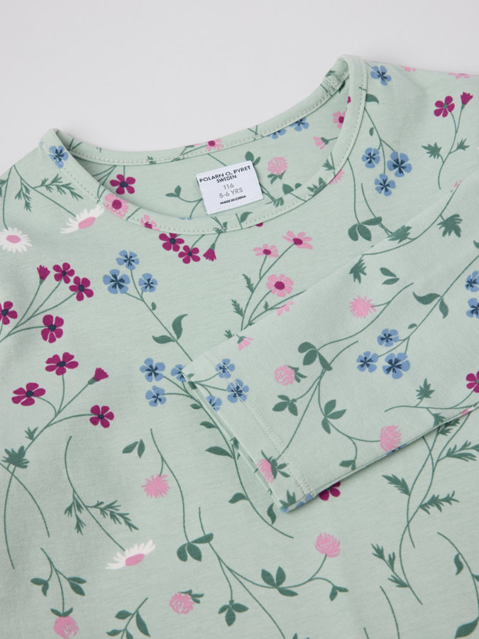 Långärmad topp blommig
