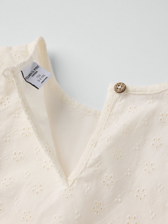 Vävd blus med volanger