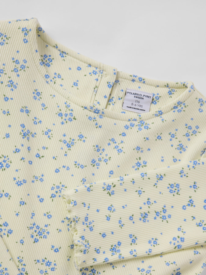 Snurrklänning blommig Snurrklänning blommig