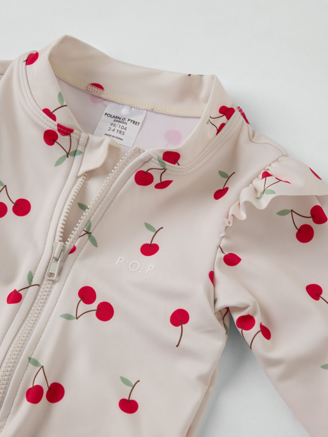 Långärmad baddräkt körsbär