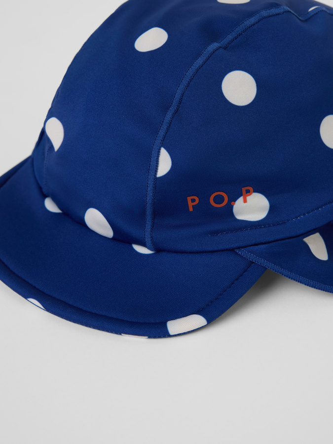 UV-keps med nackskydd prickig