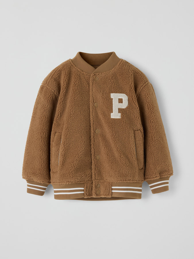 Vadderad pilejacka VARSITY Vadderad pilejacka VARSITY