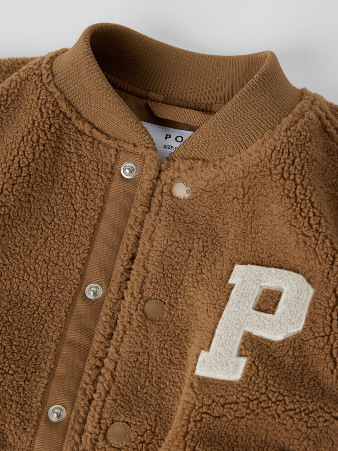 Vadderad pilejacka VARSITY Vadderad pilejacka VARSITY